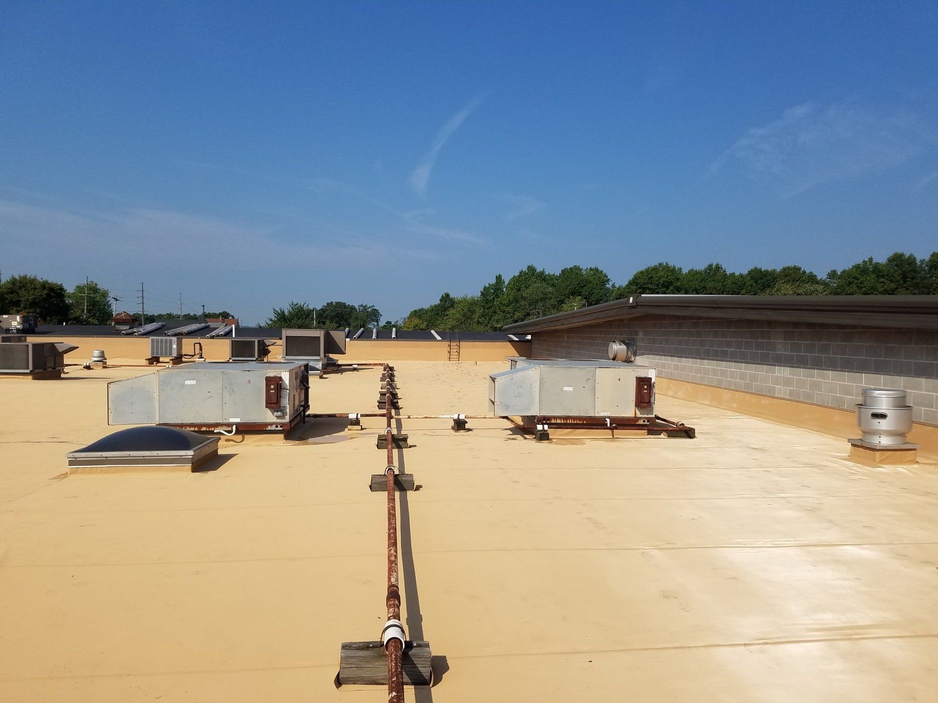 commercial roof with piping
