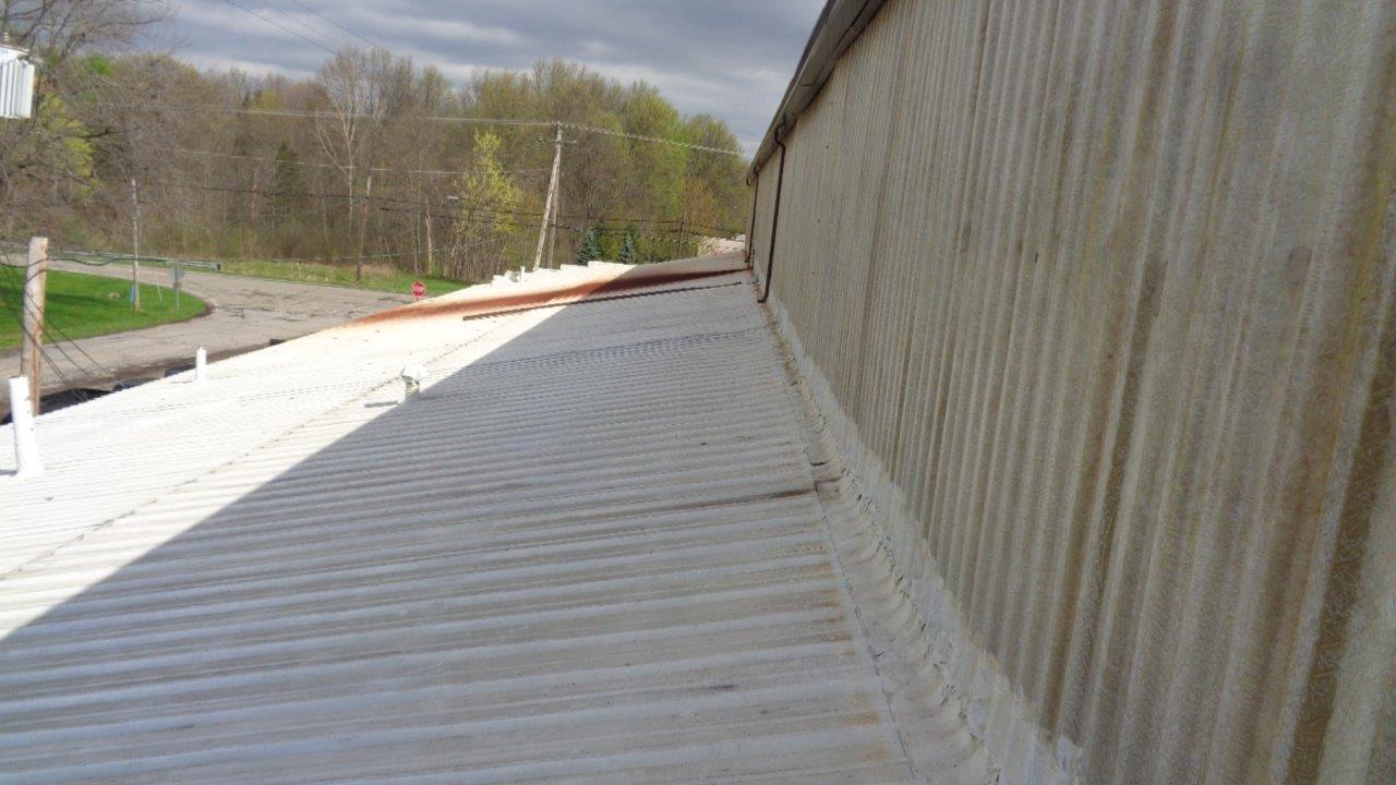 a roof before commercial roofing services