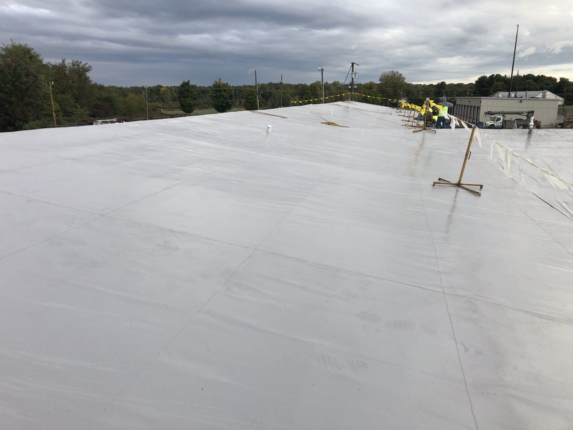 utility services building with new commercial roof system